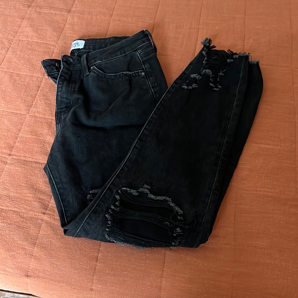 Woman’s black skinny jeans